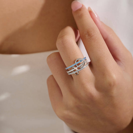 Sterling silver stacking ring with 3 layers of blue cubic zirconia