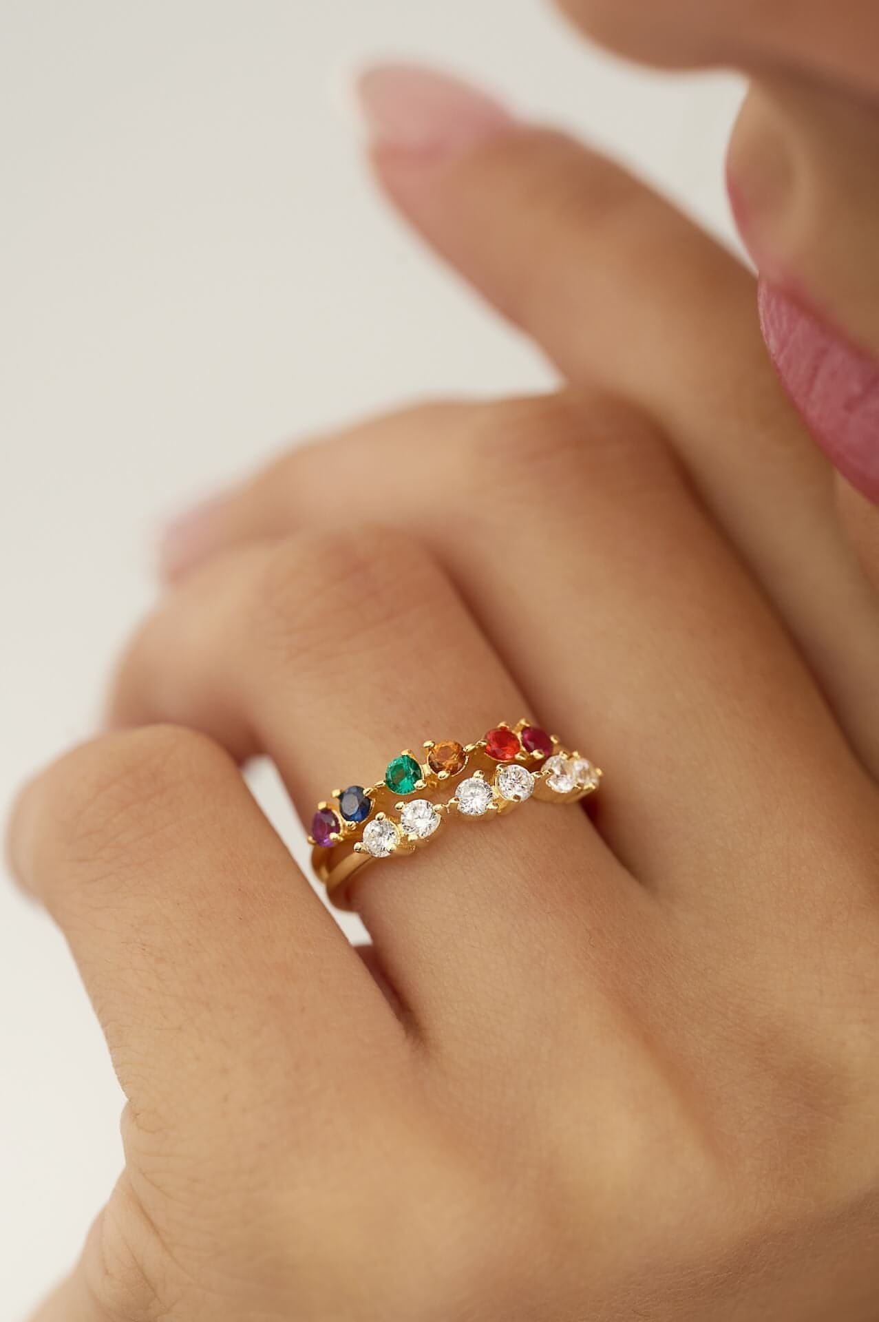 Half eternity cubic zirconia ring in 18K gold vermeil paired with rainbow half eternity
