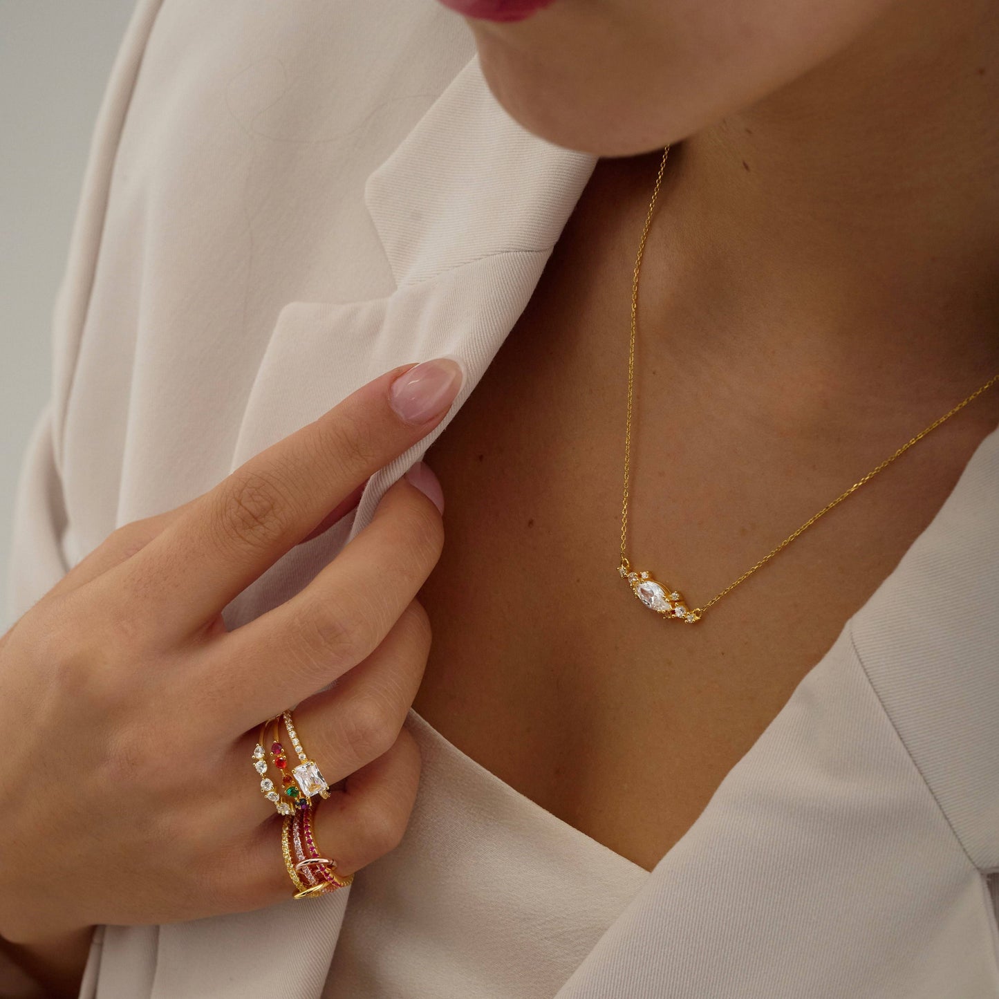 Marquise necklace paired with ring stack