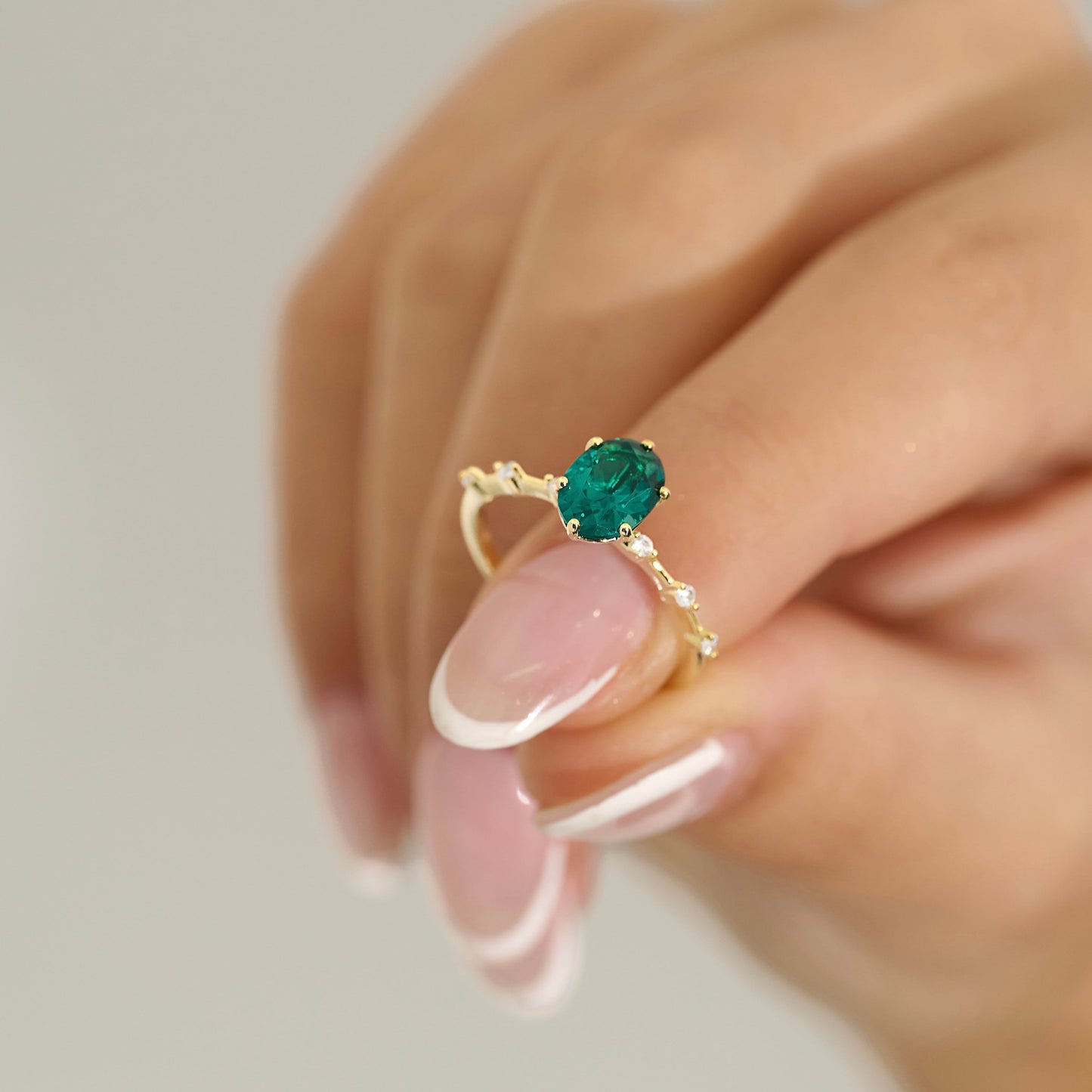 Emerald green oval gemstone set in 18K gold vermeil