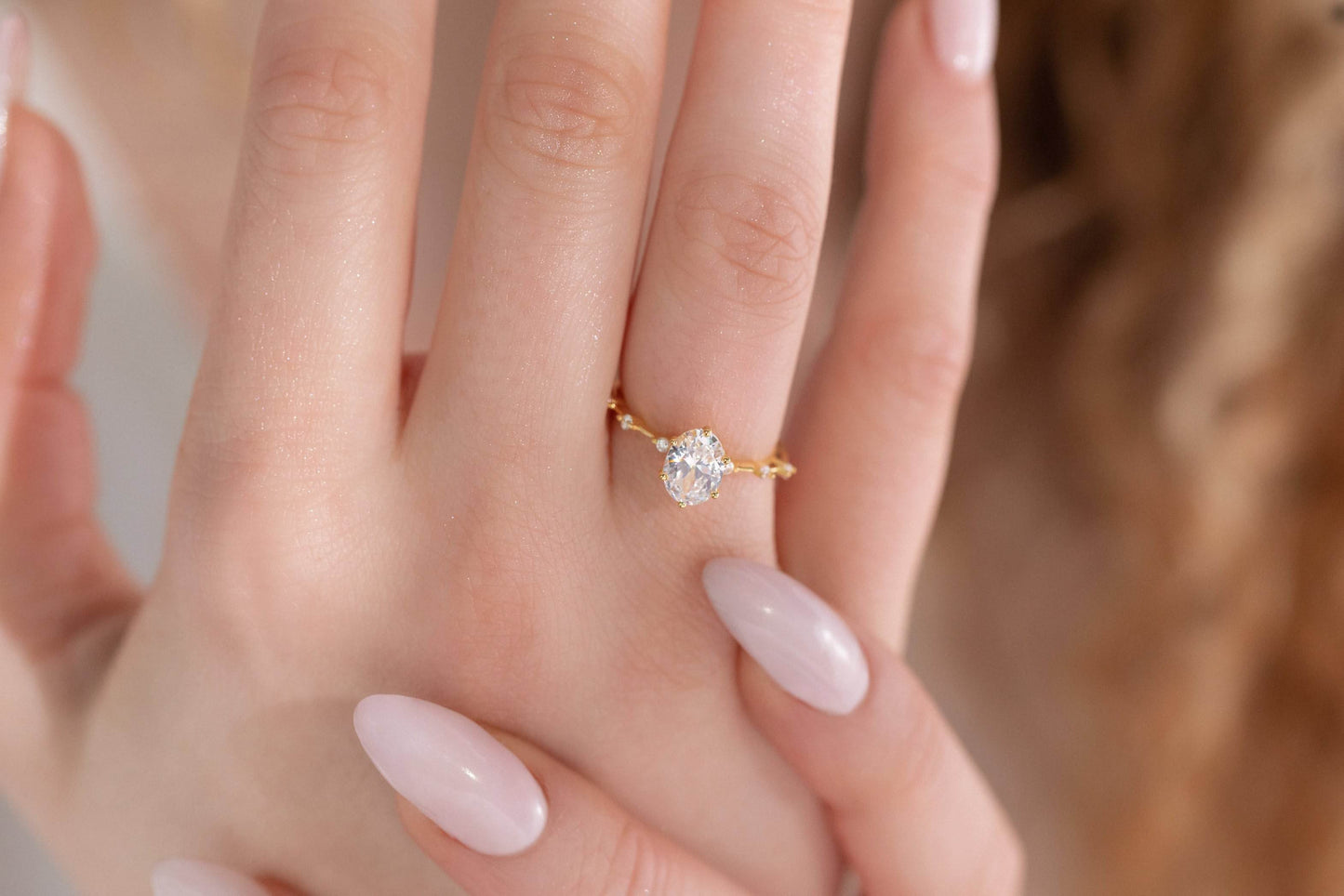 Oval ring on 18K gold vermeil band with 6 small cubic zirconia in the band