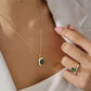 Emerald green necklace with cubic zirconia border on 18K Gold vermeil necklace paired with Emerald green oval ring a half eternity cubic zirconia ring