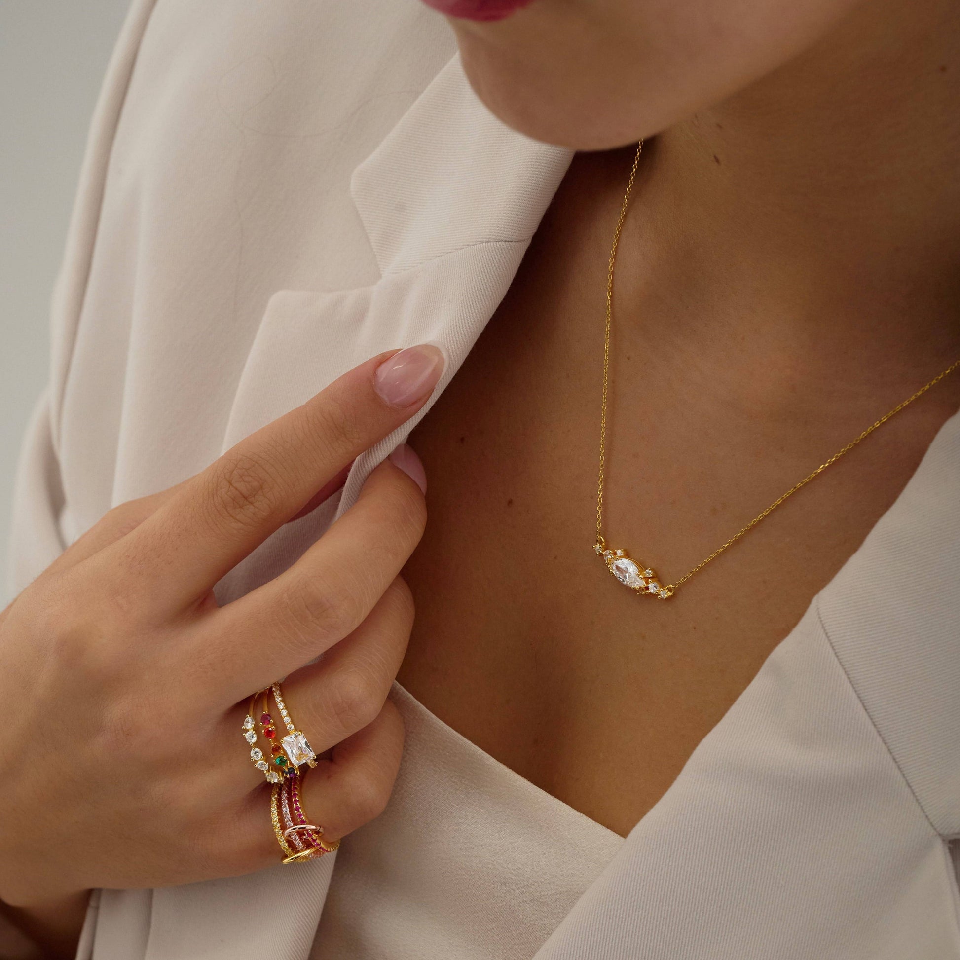 Marquise necklace paired with ring stack