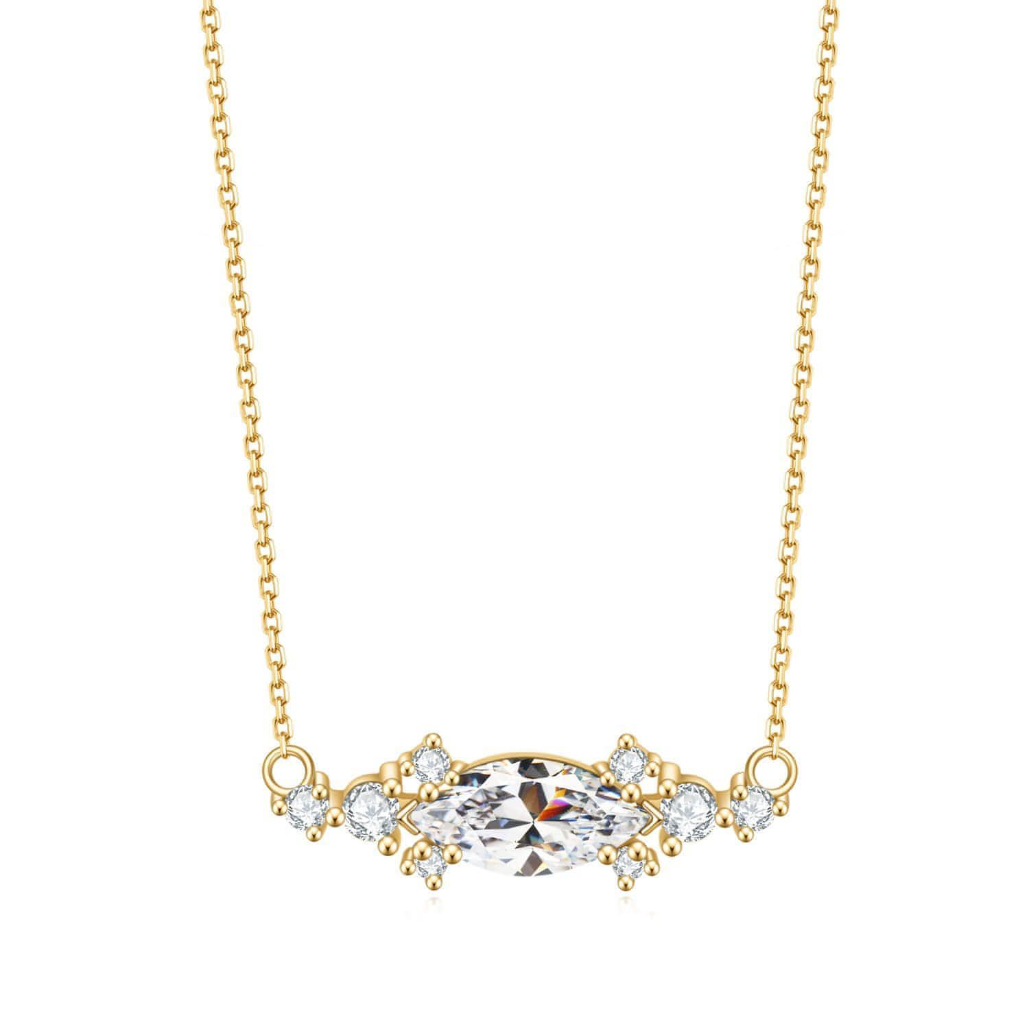 East-west marquise surrounded by round cubic zirconia on 18K gold vermeil.