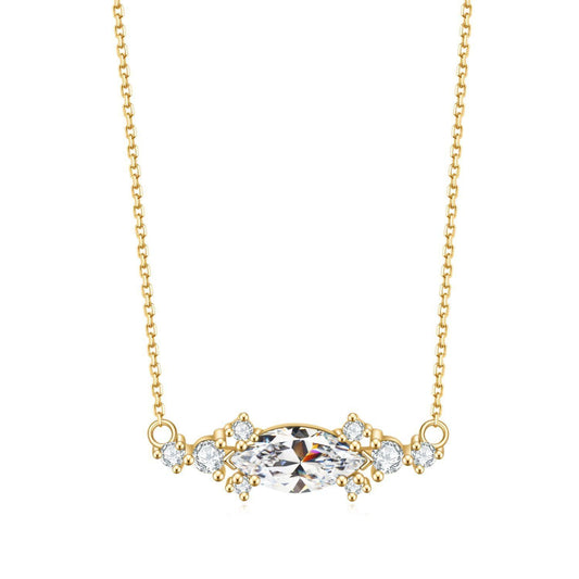 East-west marquise surrounded by round cubic zirconia on 18K gold vermeil.