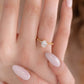 Oval ring on 18K gold vermeil band with 6 small cubic zirconia in the band